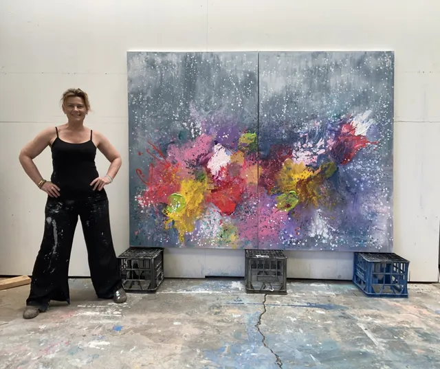 Advanced student creating large abstract expressionist paintings